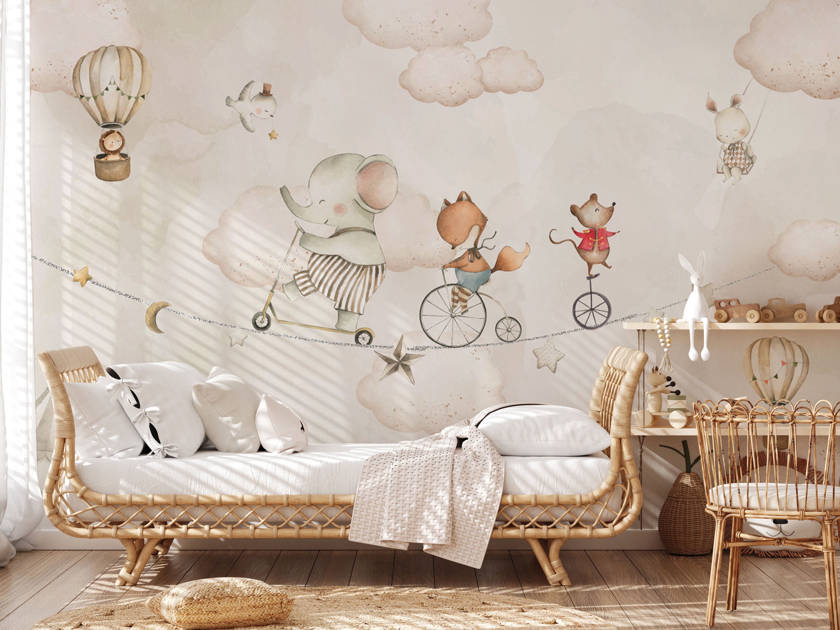 Whimsical children’s mural wallpaper with hand-painted animals balancing on clouds in soft watercolor tones