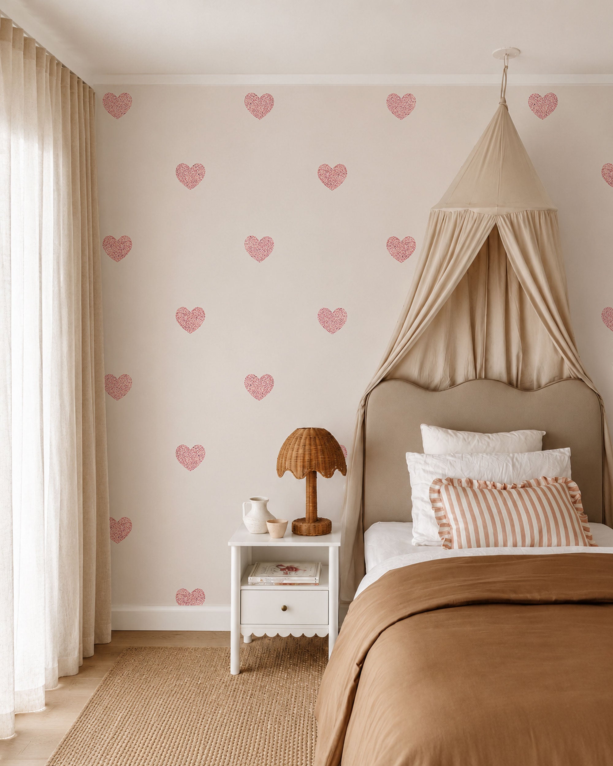 Minimal heart pattern wallpaper with soft pink and blush hearts on a warm off-white background