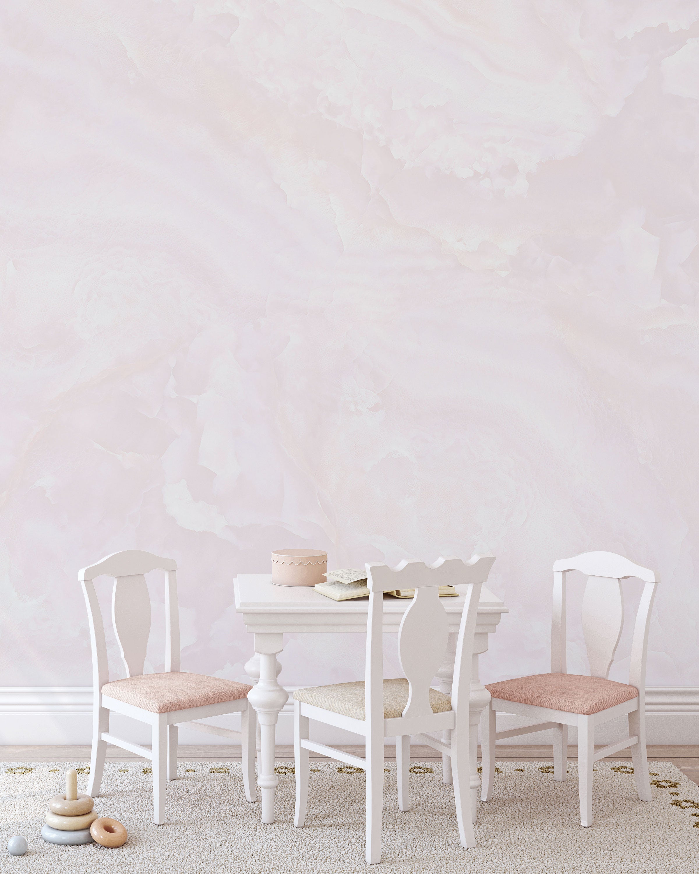 Soft pink watercolour wallpaper with gentle tonal texture and warm, airy colour transitions