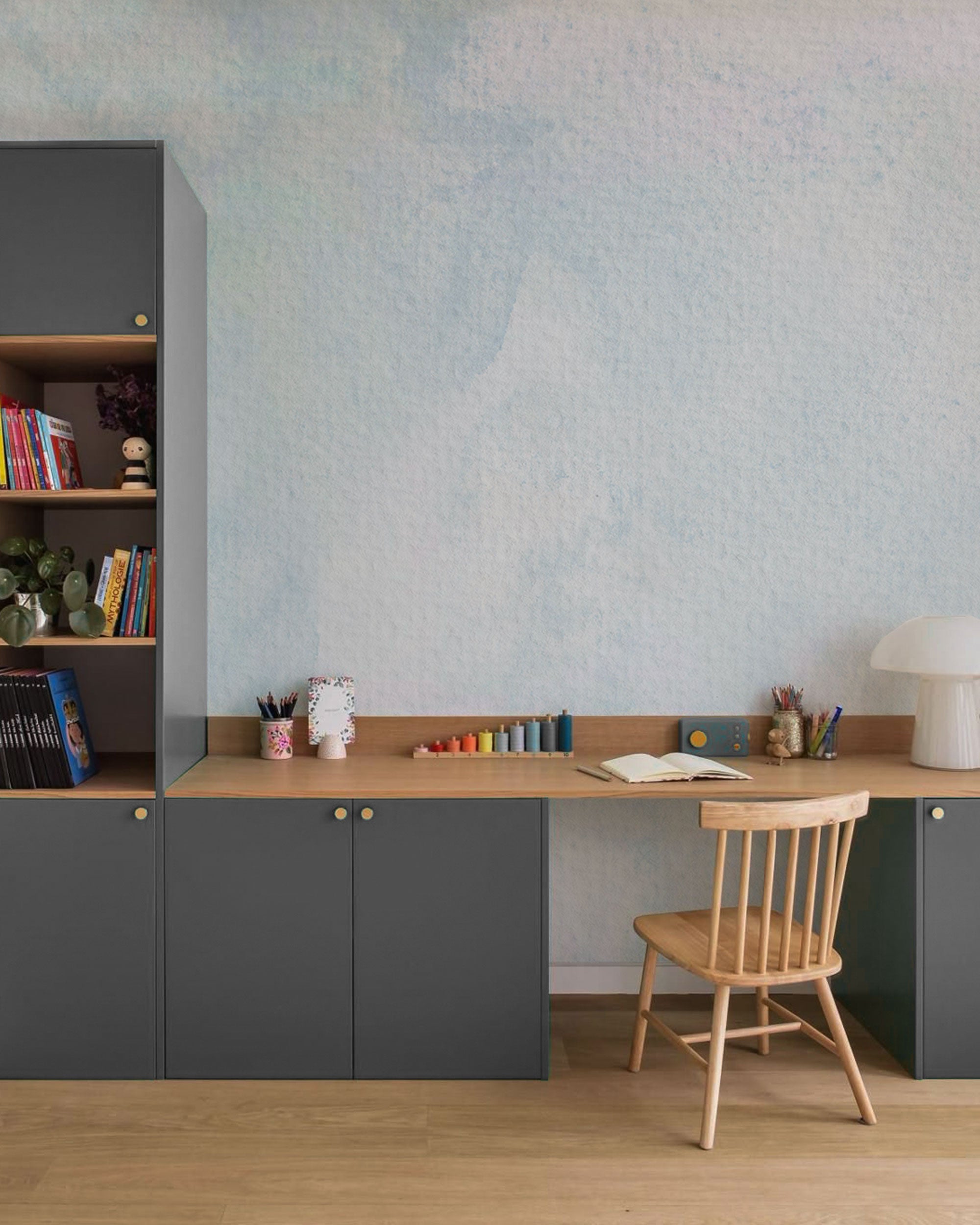 Soft blue watercolour wallpaper with gentle tonal texture and airy sky-like effect