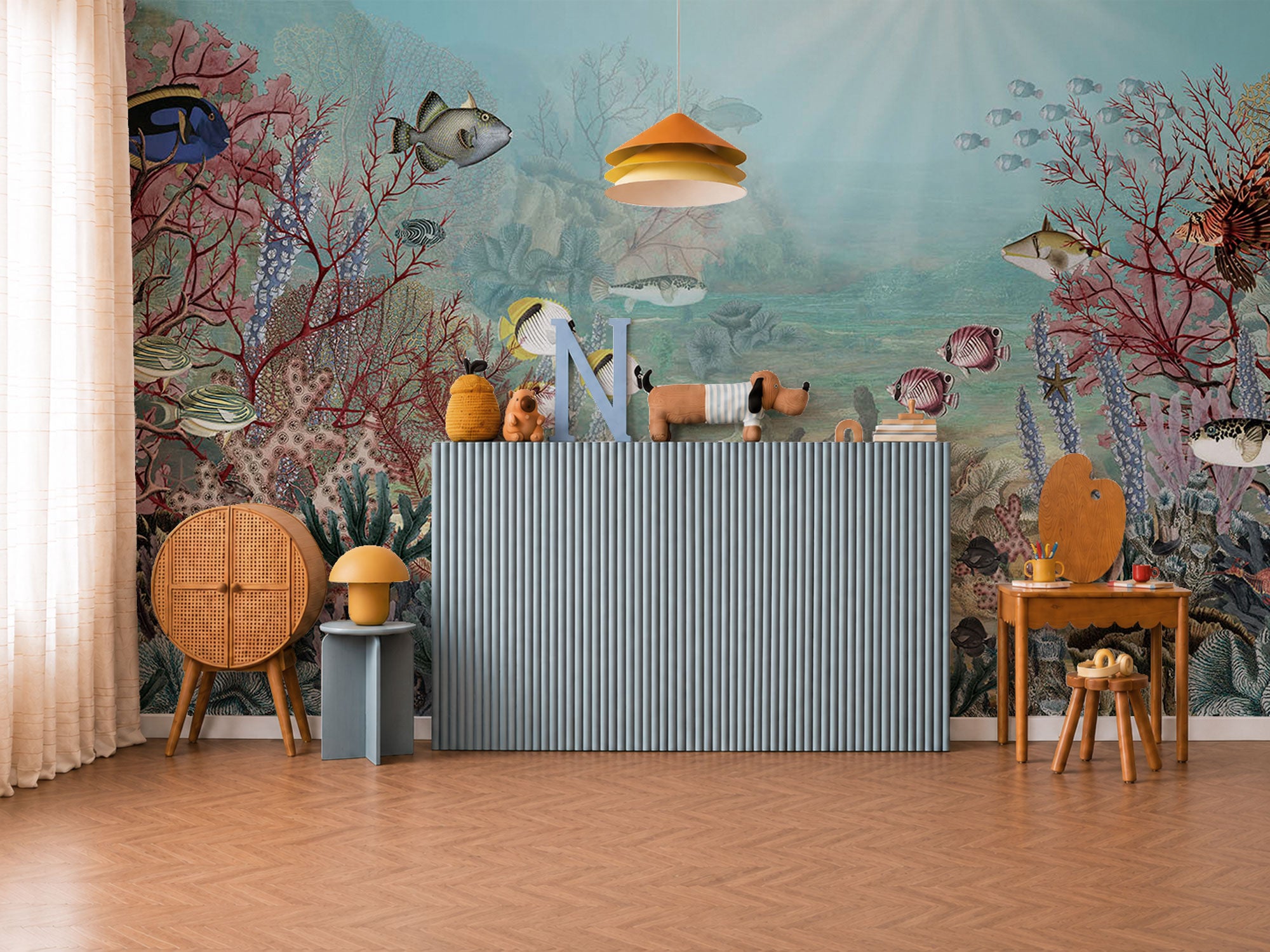 Underwater reef mural wallpaper with colorful tropical fish, coral, and soft ocean textures in a painterly style for a children’s room