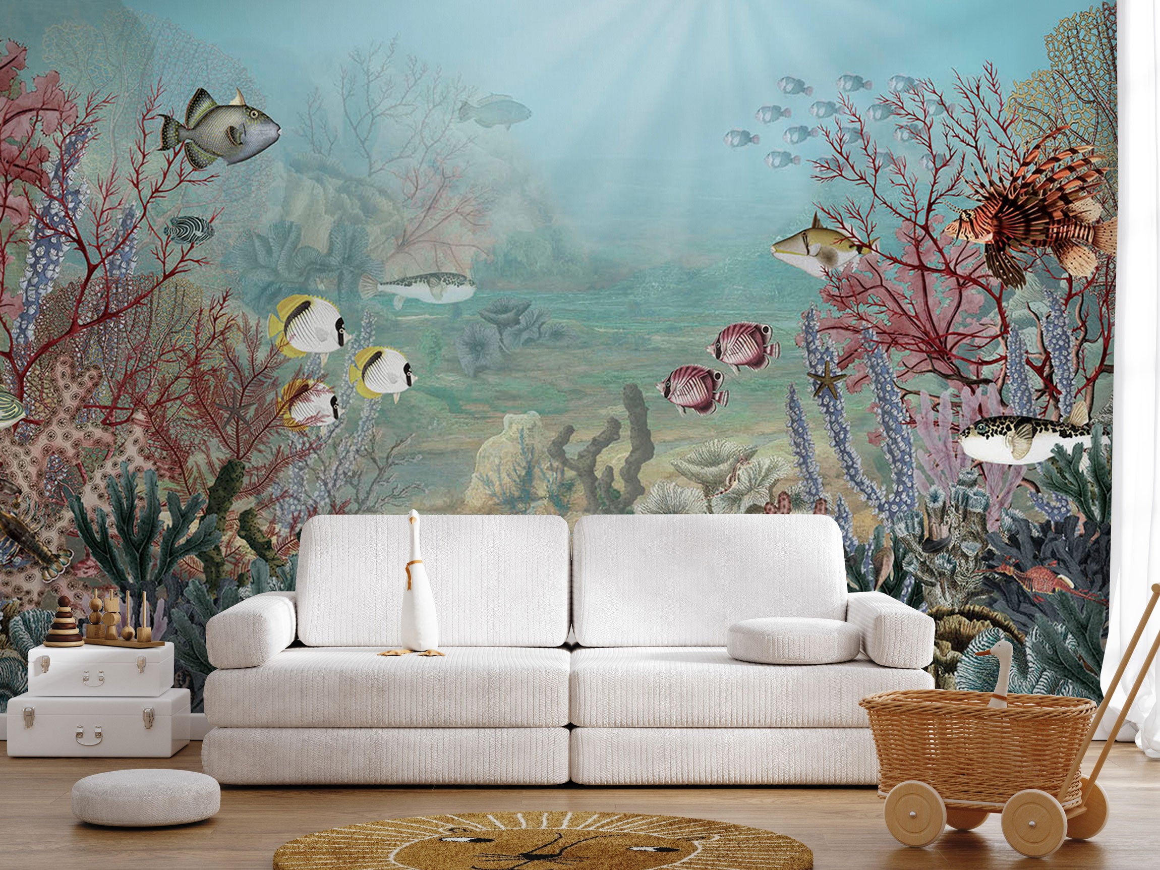 Underwater reef mural wallpaper with colorful tropical fish, coral, and soft ocean textures in a painterly style for a children’s room