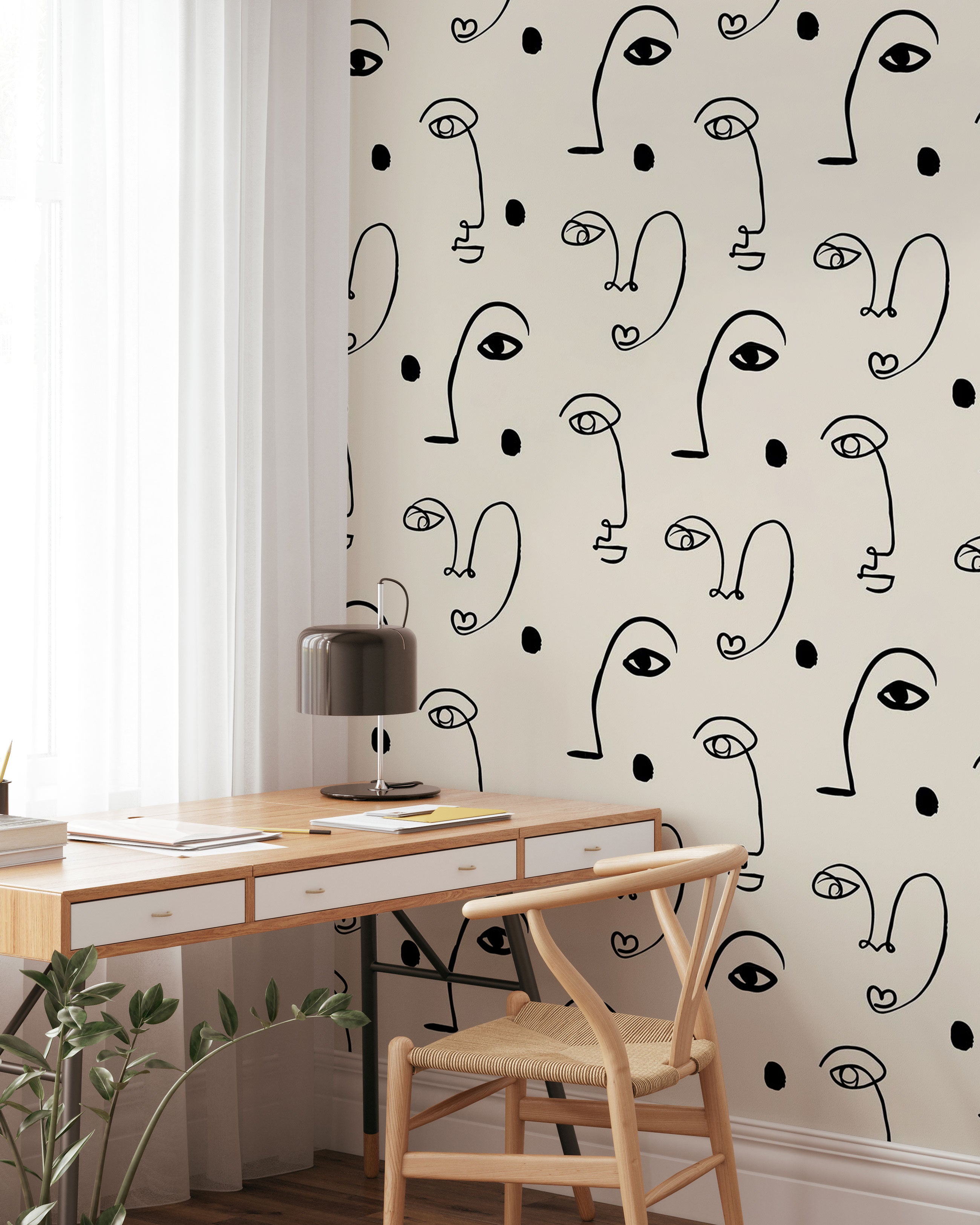 Beige pattern wallpaper with abstract black line art faces