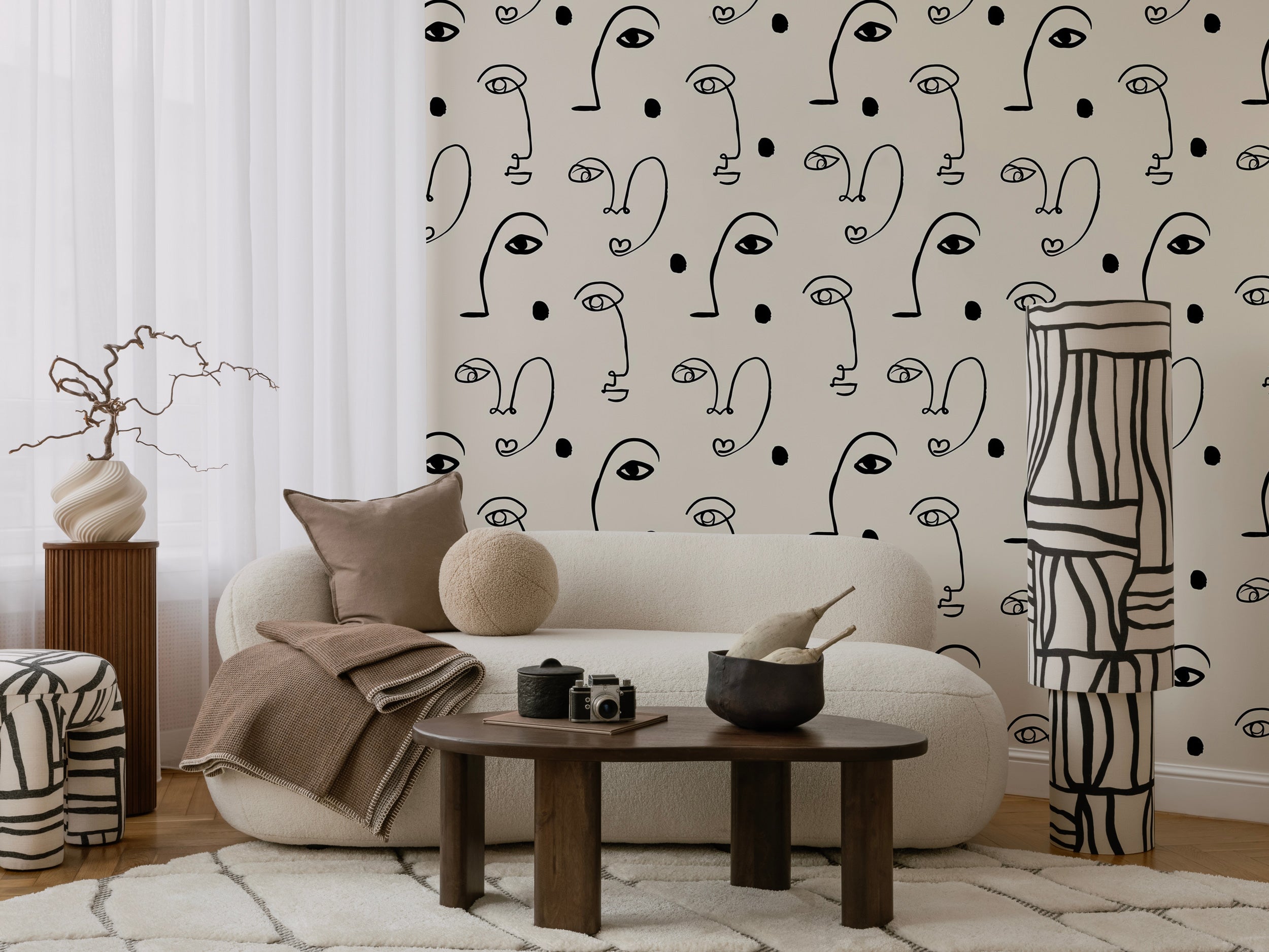 Beige pattern wallpaper with abstract black line art faces