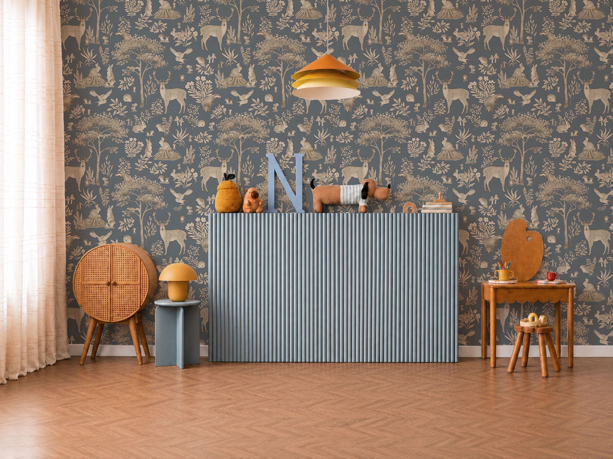 This wallpaper showcases a forest-inspired design with a vintage blue background.