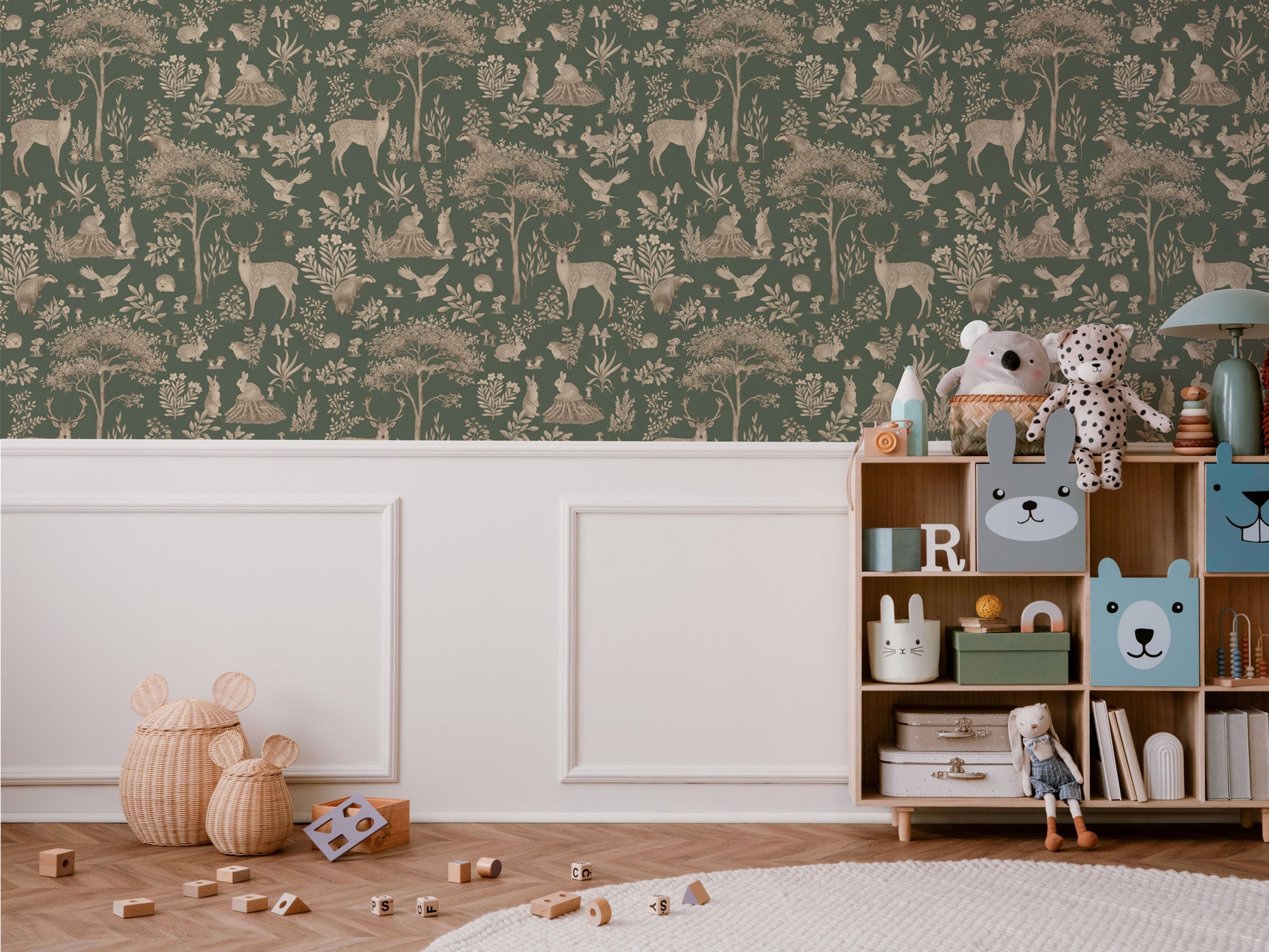 Children’s wallpaper with hand-drawn forest animals and botanical illustrations in soft green tones inspired by woodland nature