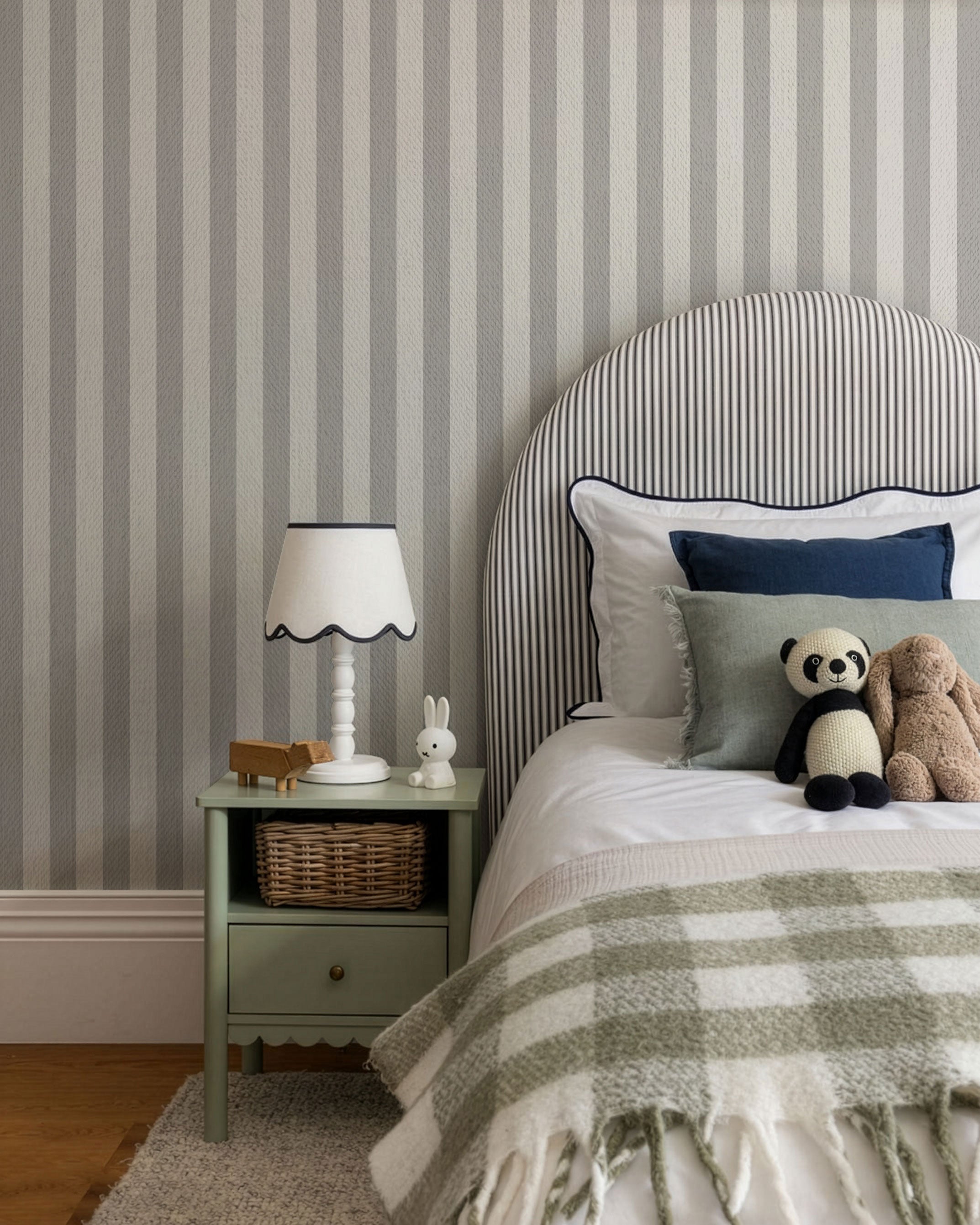 Grey and white striped kids wallpaper with soft vertical lines and subtle textured surface
