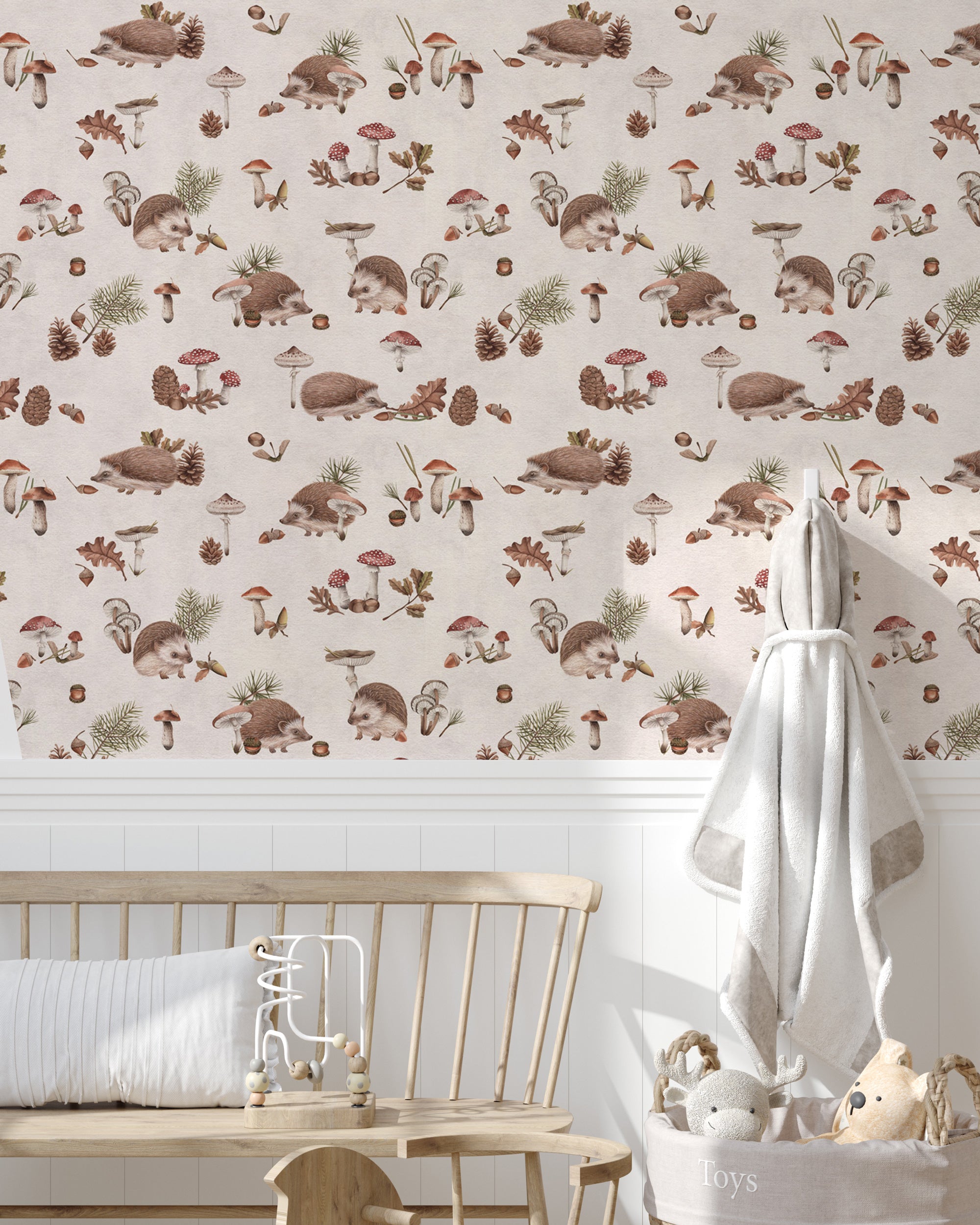 Beige nursery wallpaper with watercolor hedgehogs, mushrooms, pinecones, leaves, and woodland elements.