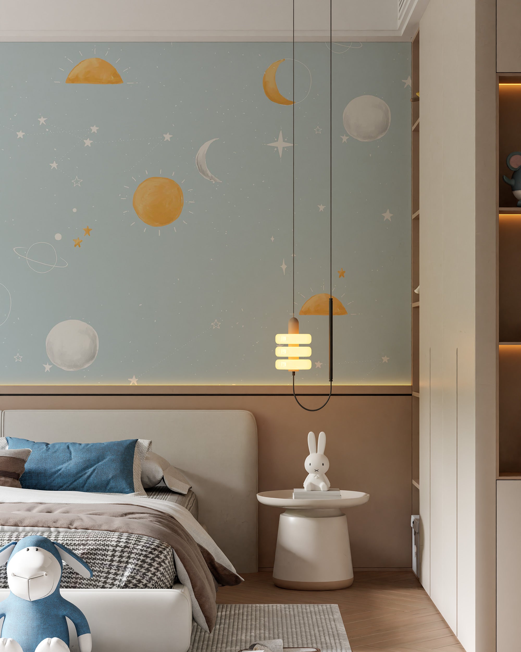 Soft celestial wallpaper with hand-painted suns, moons, planets, and stars on a light blue background creating a calm, dreamy atmosphere