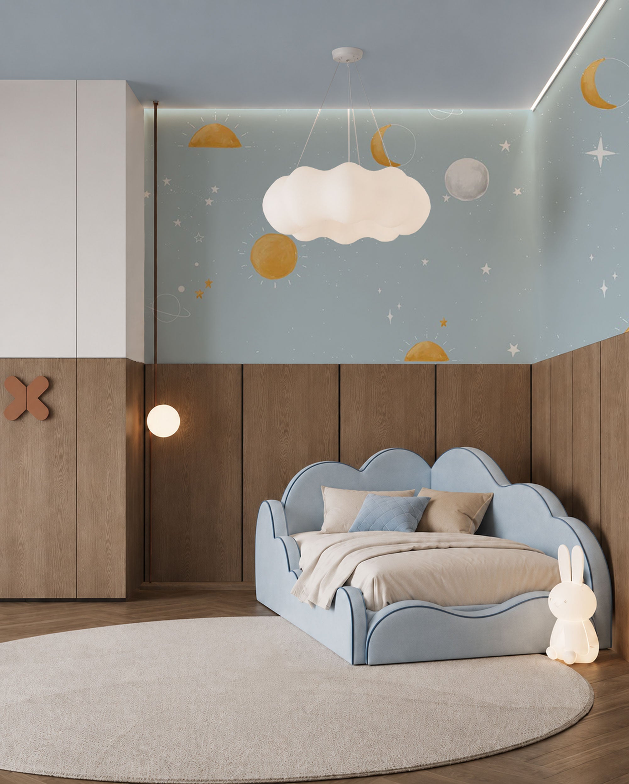 Soft celestial wallpaper with hand-painted suns, moons, planets, and stars on a light blue background creating a calm, dreamy atmosphere