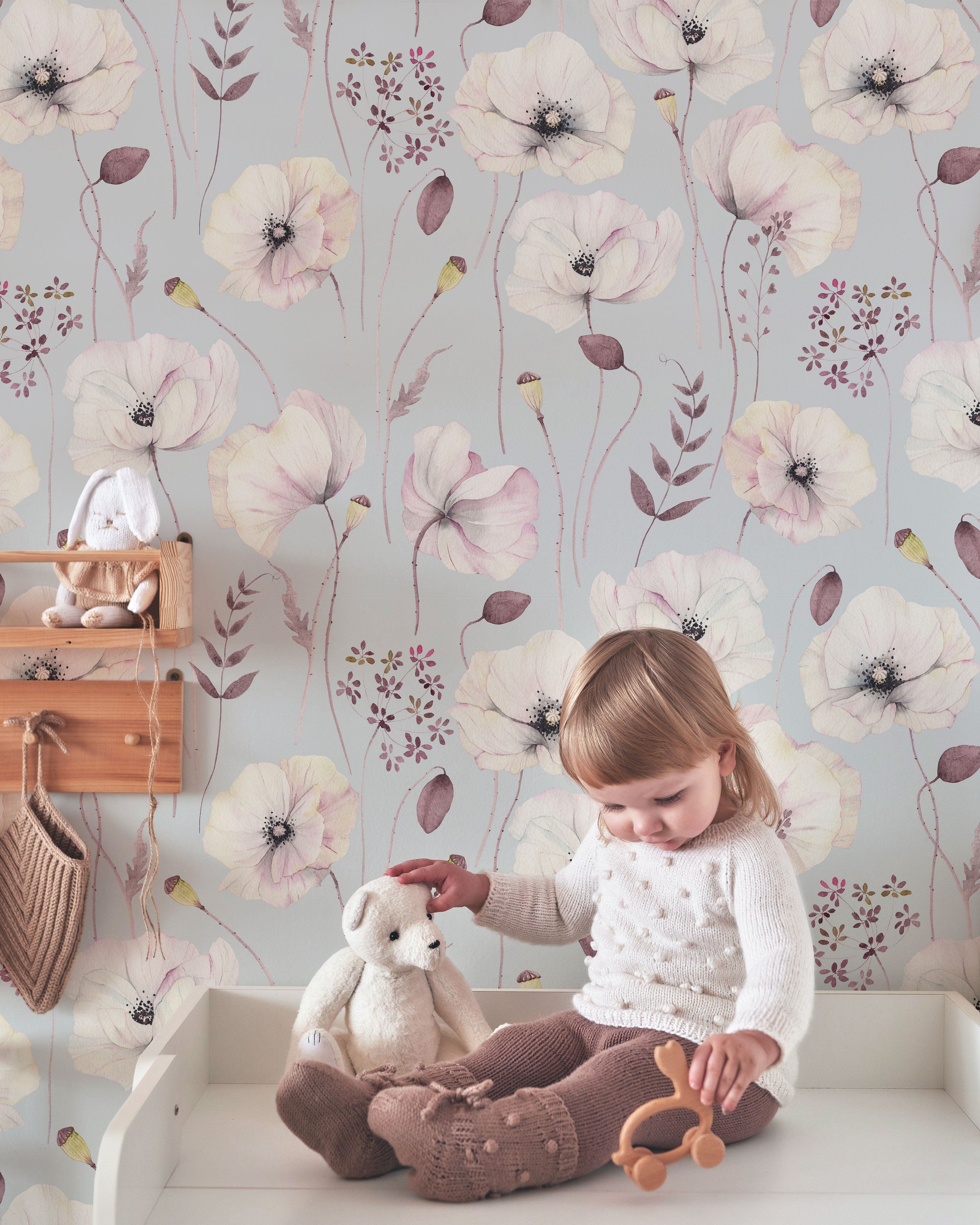 pastel floral wallpaper with delicate illustrated flowers, slender stems, and botanical details on a light background