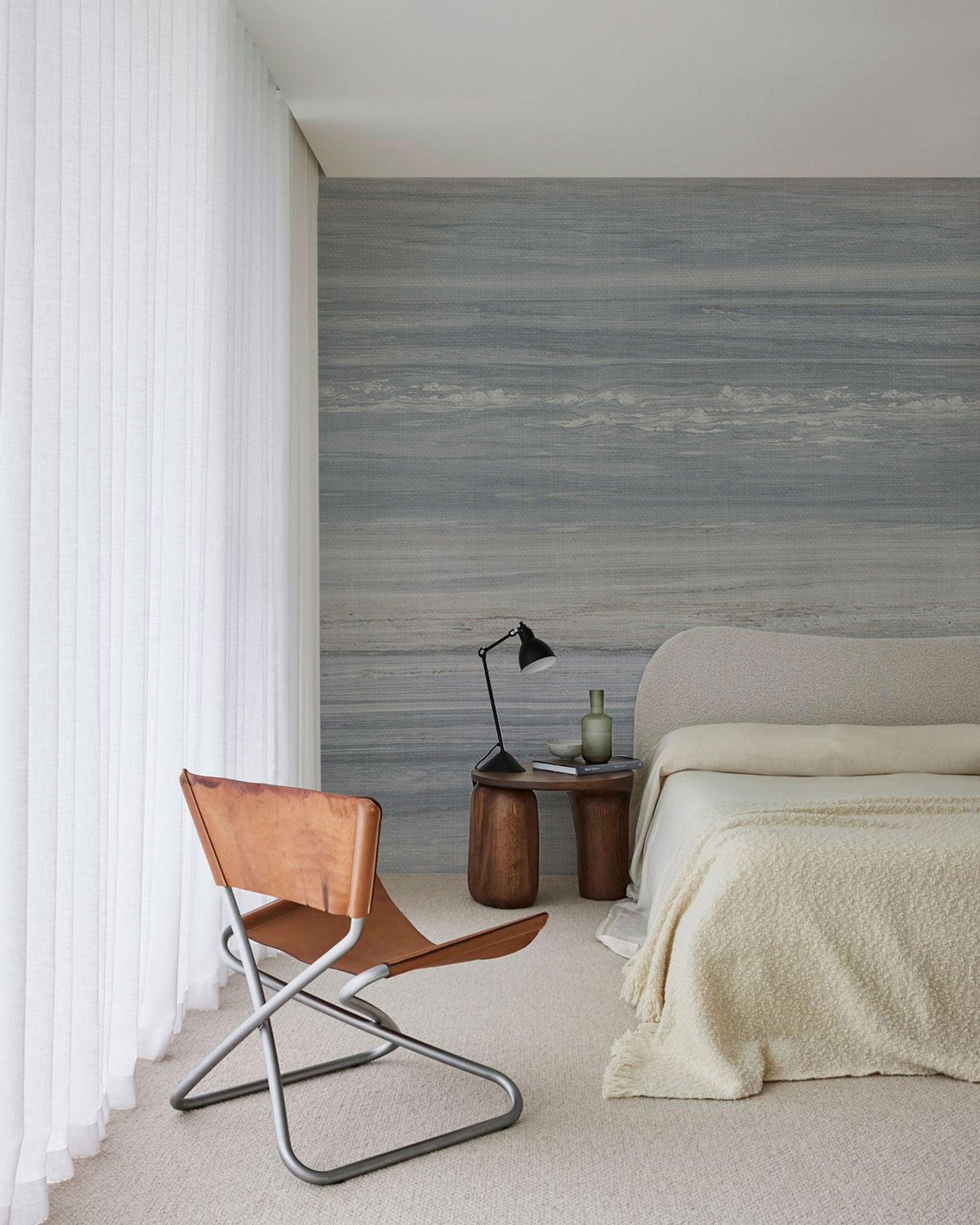 Blue grey and beige textured wallpaper with soft horizontal layers and subtle natural surface texture