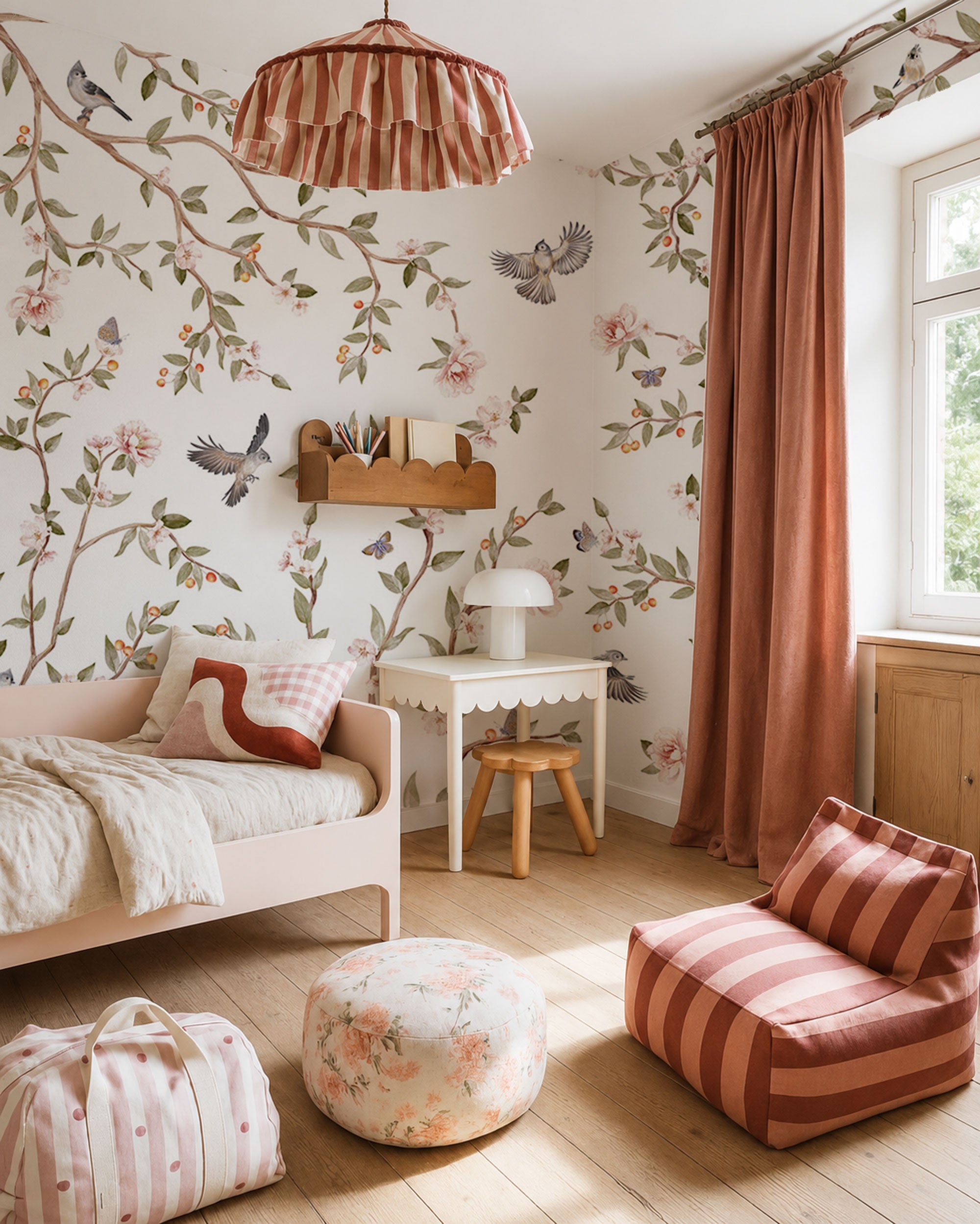 Floral kids wallpaper with cherry blossom branches birds and butterflies in soft pastel colors.